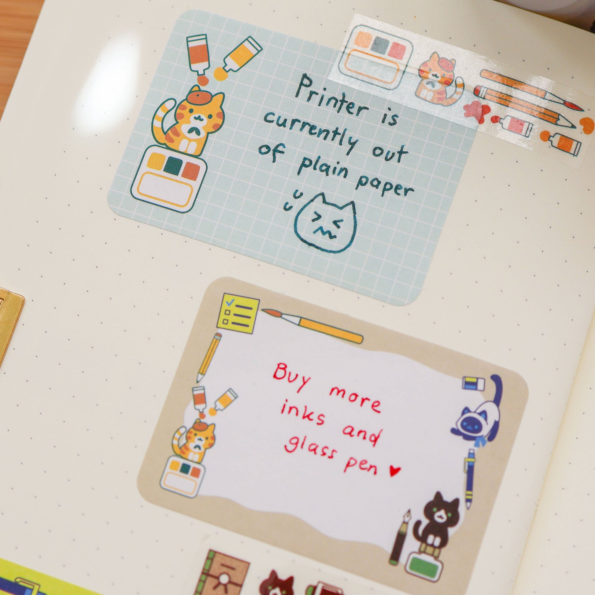 Two cartoon-style paper pads with humorous text on a notebook page.