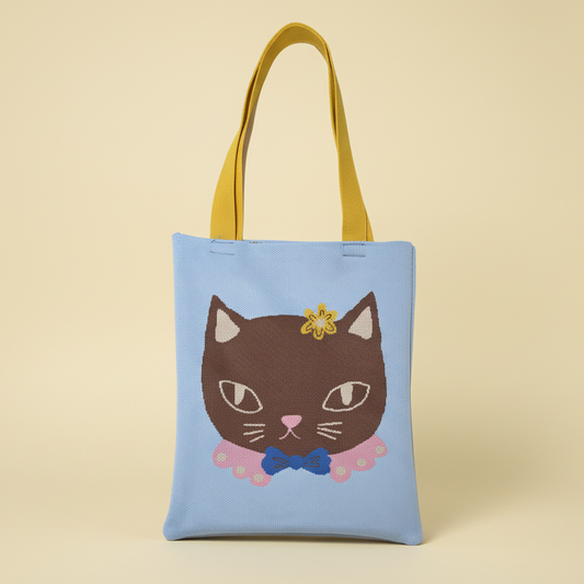 Tote bag with a cat design on a beige background