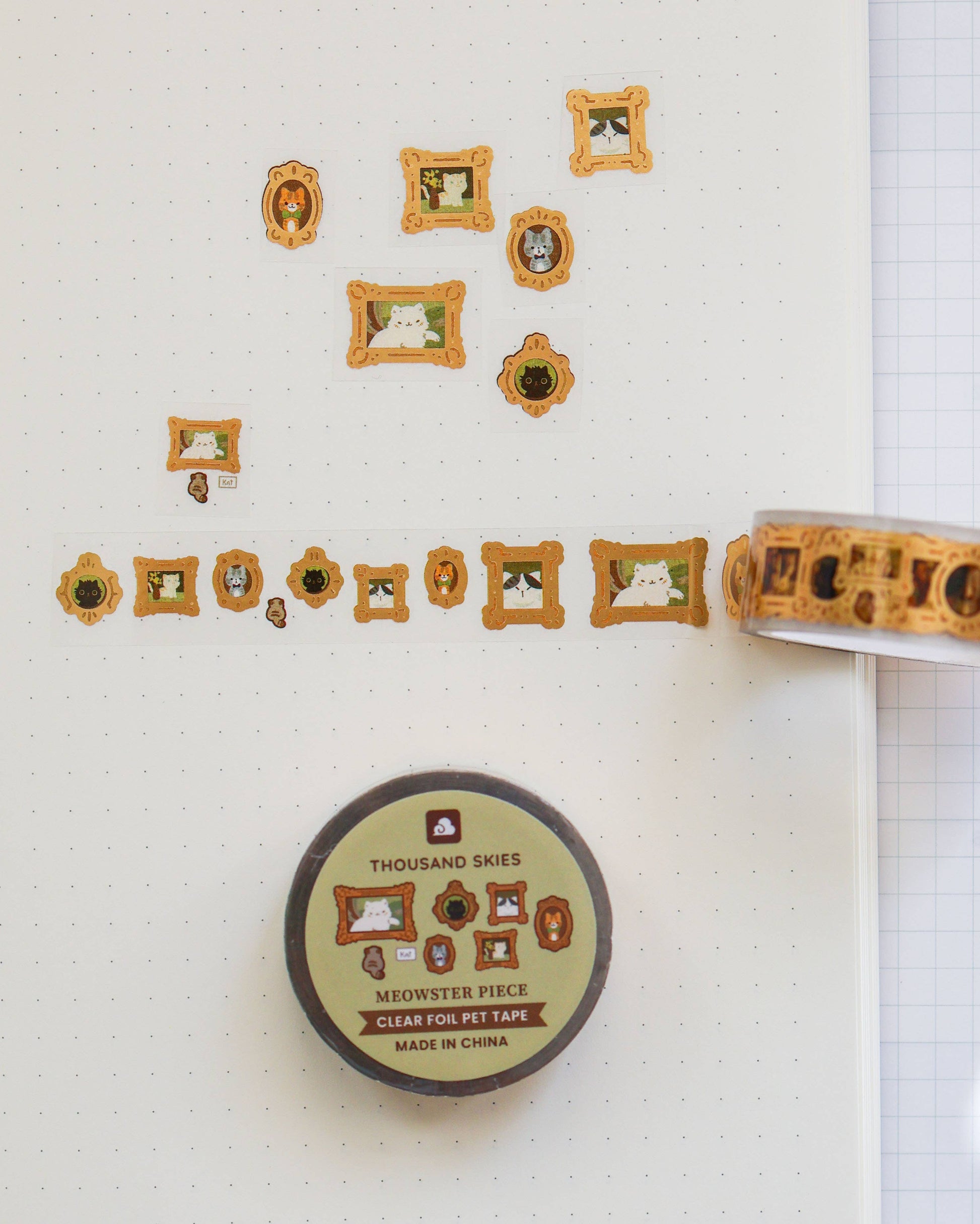 Decorative tape with picture frame designs on a white surface