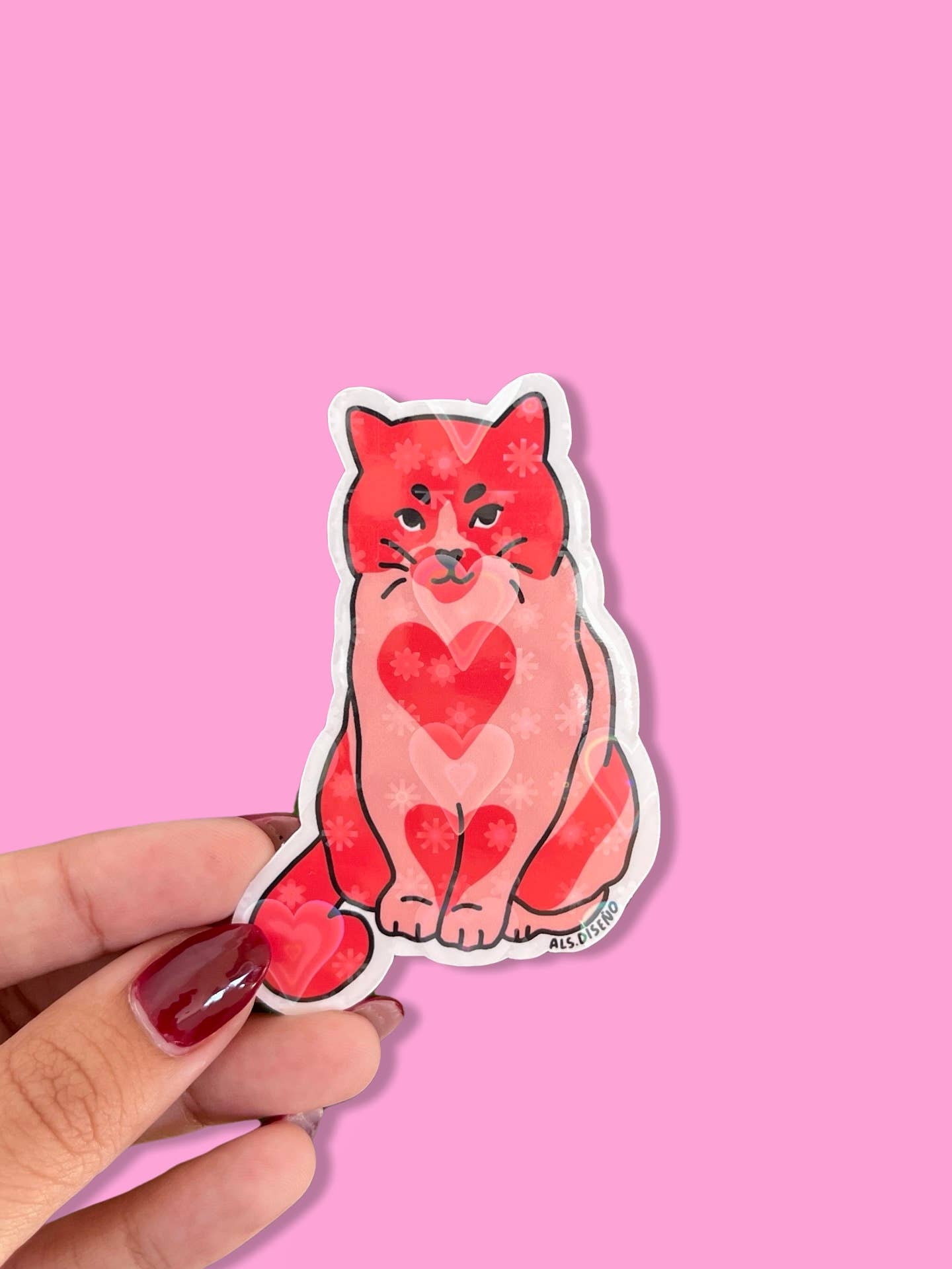 Sticker of a red cat with a heart on a pink background