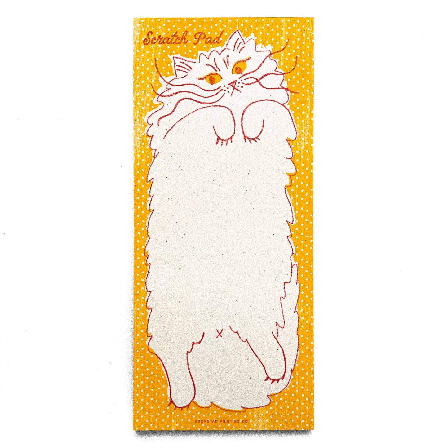 Scratch pad with a cat illustration on a yellow polka dot background